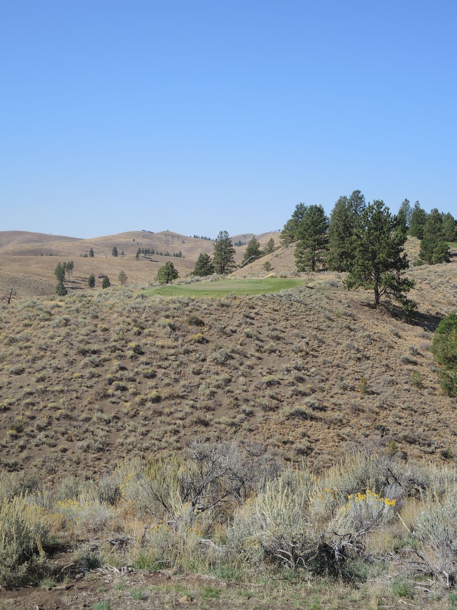 The infamous all-carry 2nd hole at McVeigh's Gauntlet — a green perched across a sagebrush ravine